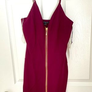 Spaghetti strap burgundy dress.